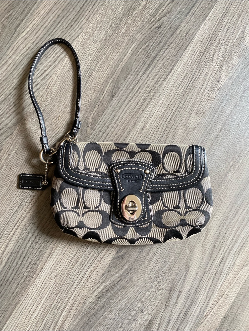 Coach Signature legacy turnlock Wristlet